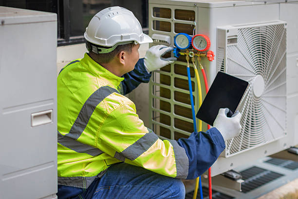 Professional Heat Pump Repair technician working in Warren, RI